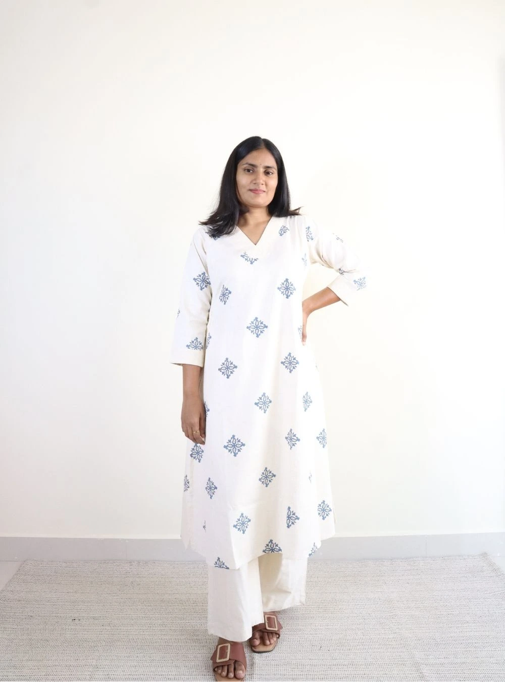 white coloured floral print kurta set